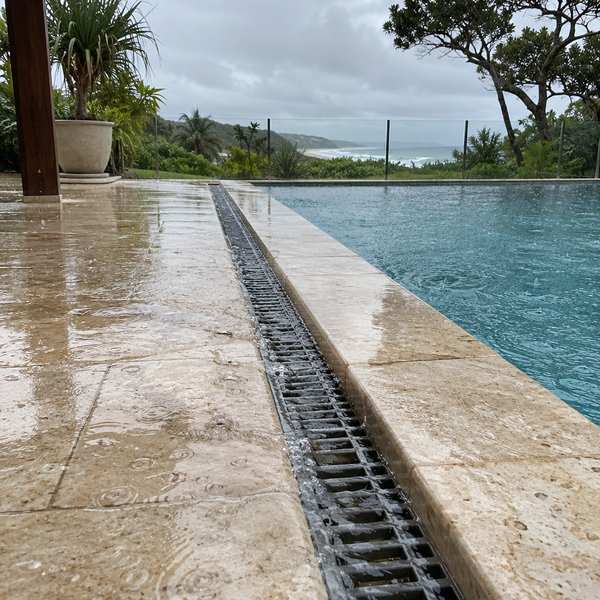 A Surround Built to Handle Salt Air and Storms - Pool Landscaping in Lake Macquarie